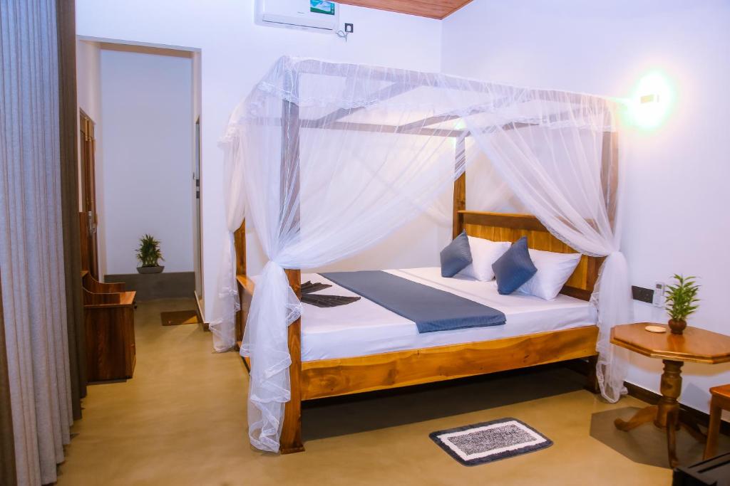 Postel nebo postele na pokoji v ubytování Ruvee Nature Rest