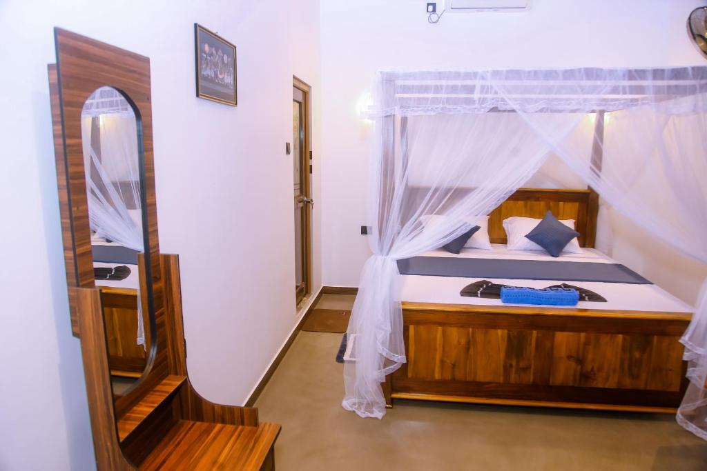Postel nebo postele na pokoji v ubytování Ruvee Nature Rest