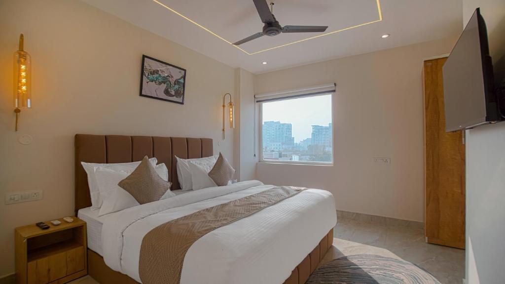Postel nebo postele na pokoji v ubytování Perfectstayz Premium Varanasi