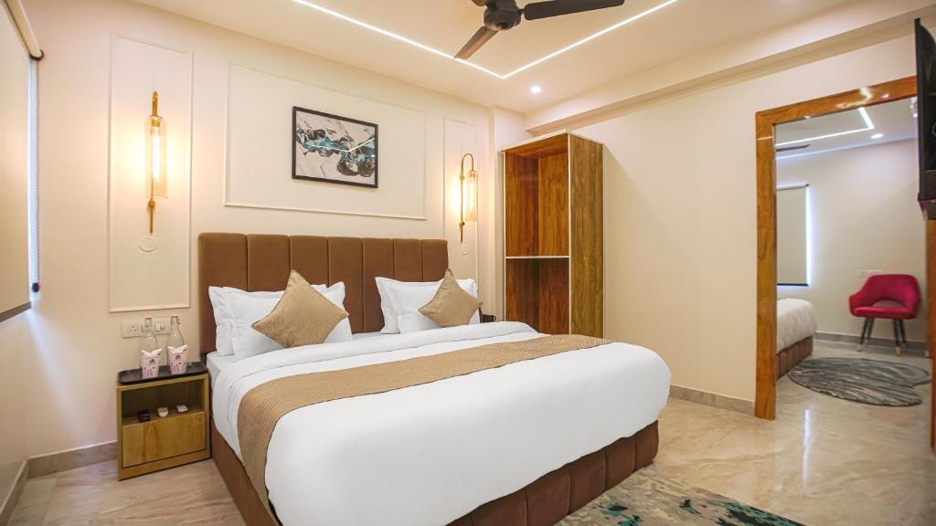 Postel nebo postele na pokoji v ubytování Perfectstayz Premium Varanasi