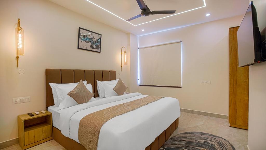 Postel nebo postele na pokoji v ubytování Perfectstayz Premium Varanasi