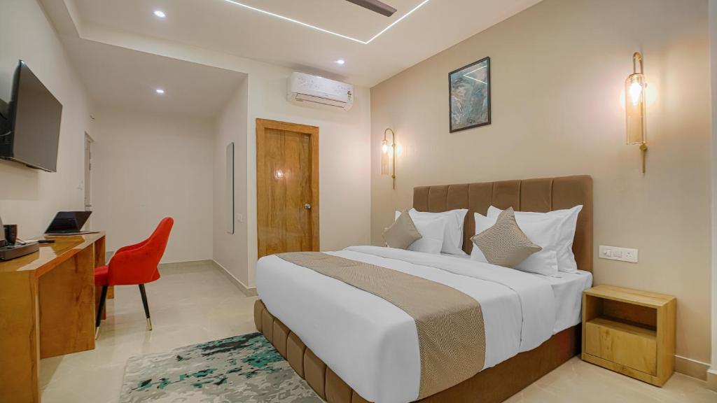 Postel nebo postele na pokoji v ubytování Perfectstayz Premium Varanasi