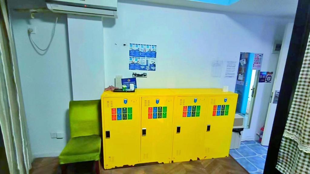 Postel nebo postele na pokoji v ubytování Qiannuo Youth Hostel