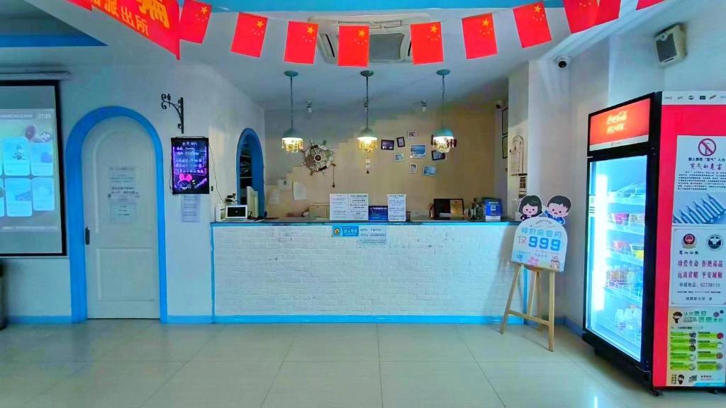 Vstupní hala nebo recepce v ubytování Qiannuo Youth Hostel