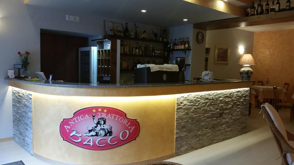 The lounge or bar area at Albergo B&B Antica Trattoria Bacco