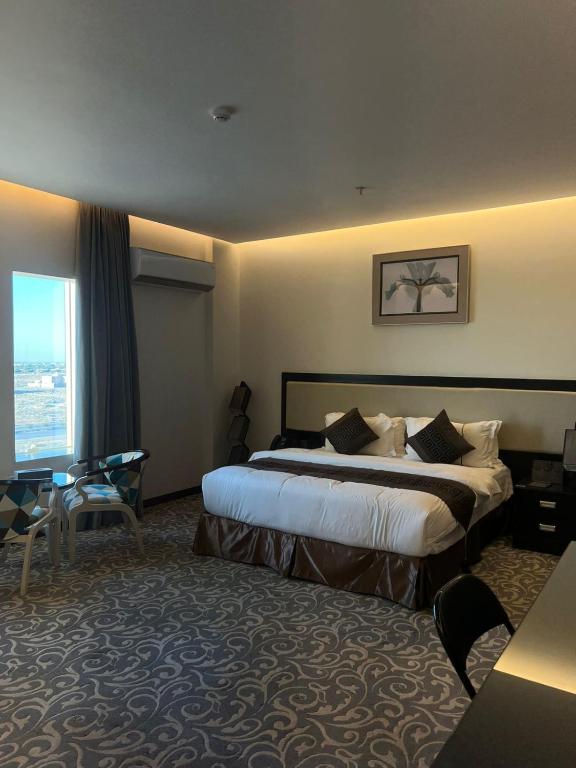 Postel nebo postele na pokoji v ubytování MBN ARTAMA Hotel