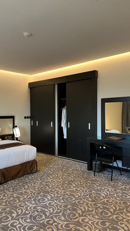 Postel nebo postele na pokoji v ubytování MBN ARTAMA Hotel