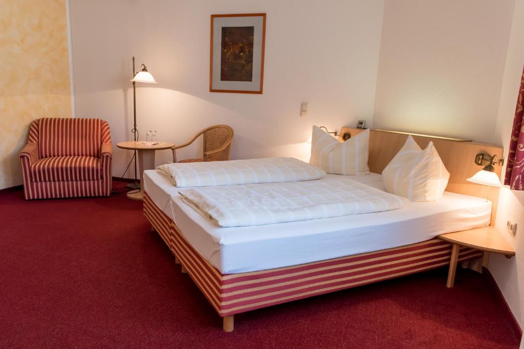 Voodi või voodid majutusasutuse Hotel Weidenmühle toas