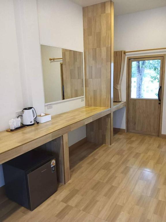 Kuchyň nebo kuchyňský kout v ubytování Three Bays Resort