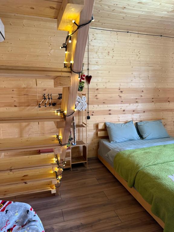 Postel nebo postele na pokoji v ubytování sweet village