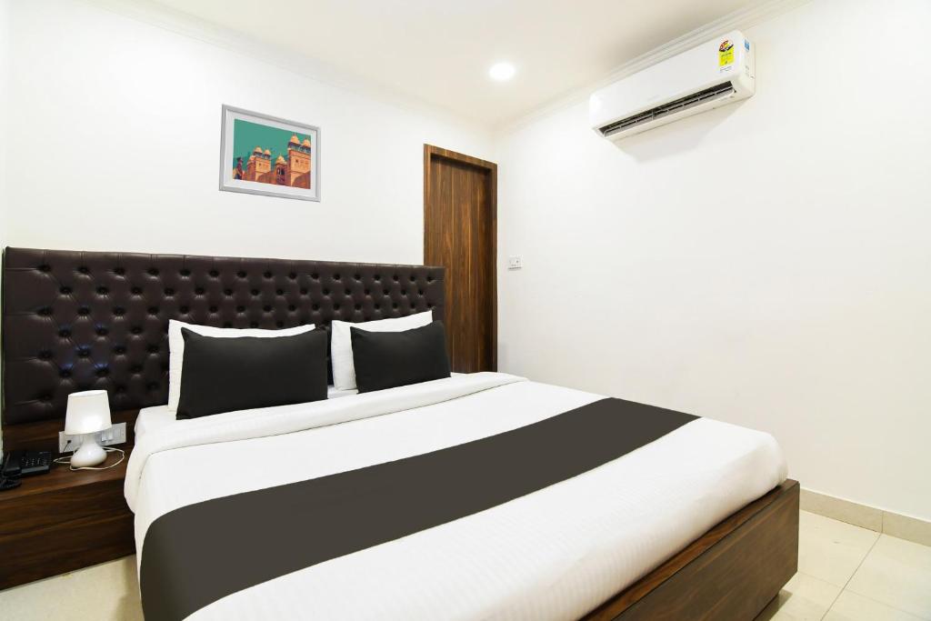 Postel nebo postele na pokoji v ubytování Super Hotel O Eminent Hotel