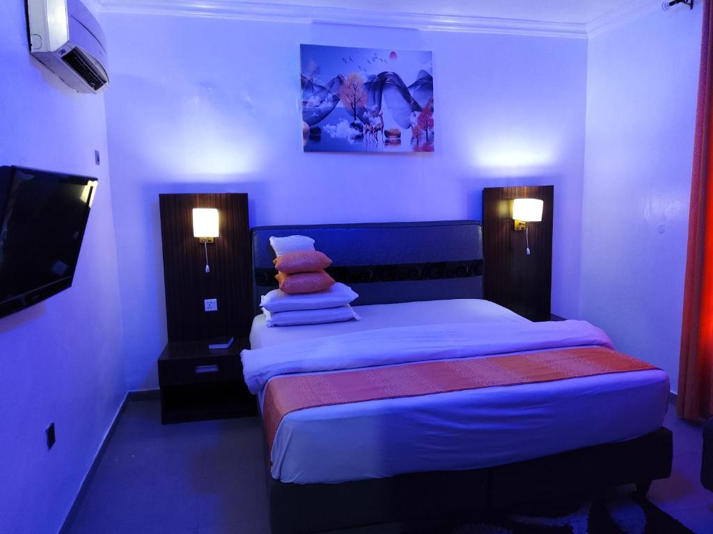 Voodi või voodid majutusasutuse Crownedge Hotels toas