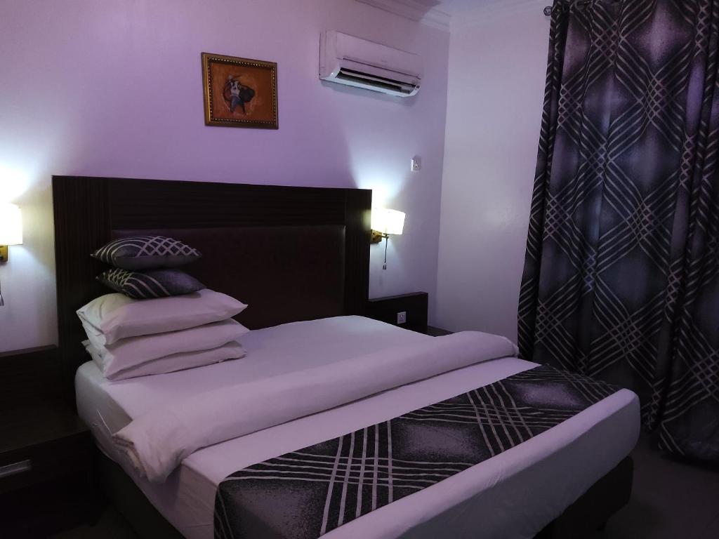 Voodi või voodid majutusasutuse Crownedge Hotels toas