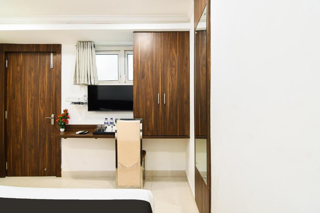 TV a/nebo společenská místnost v ubytování Super Hotel O Eminent Hotel