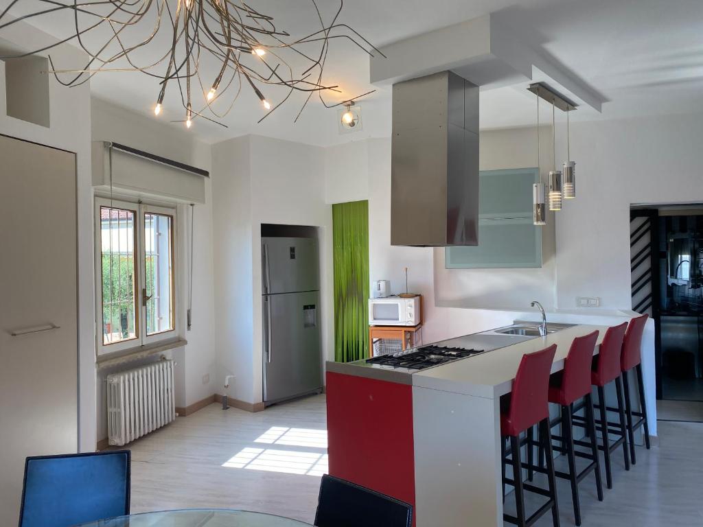a kitchen with a sink and a counter top at Appartamento Casa Anna in Garda