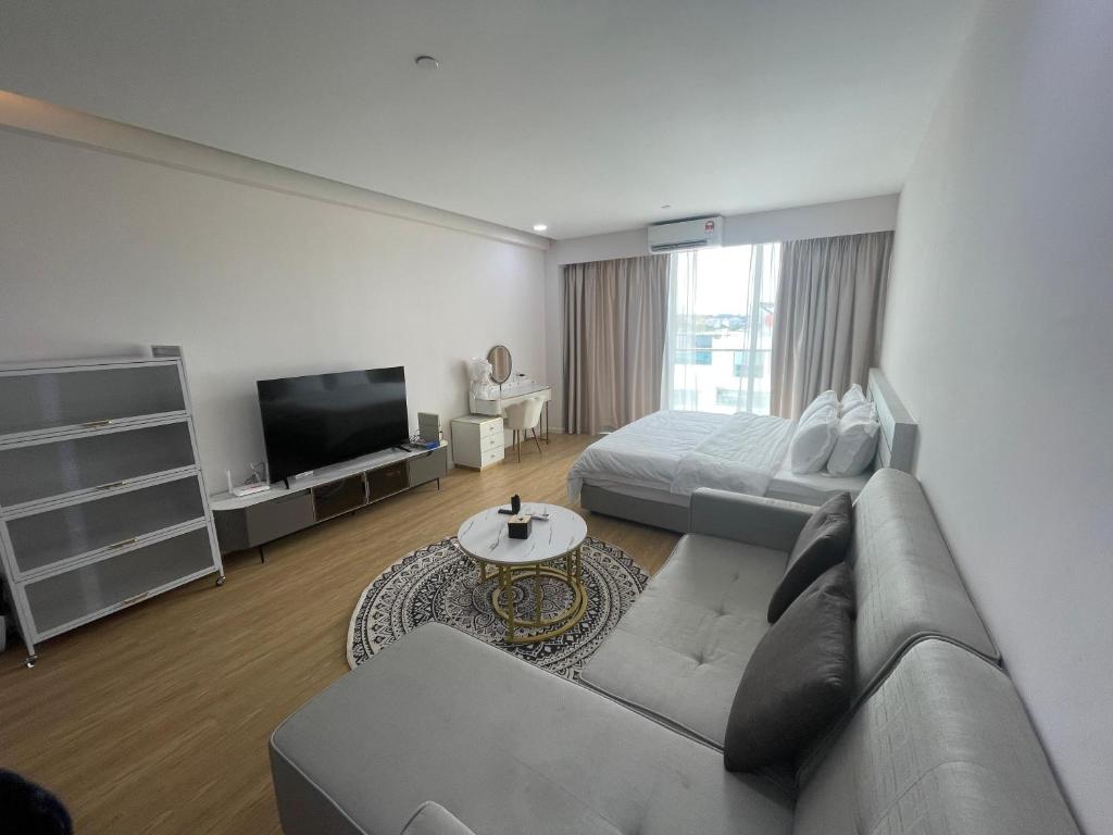 TV a/nebo společenská místnost v ubytování KO-Z Place Aru Suites