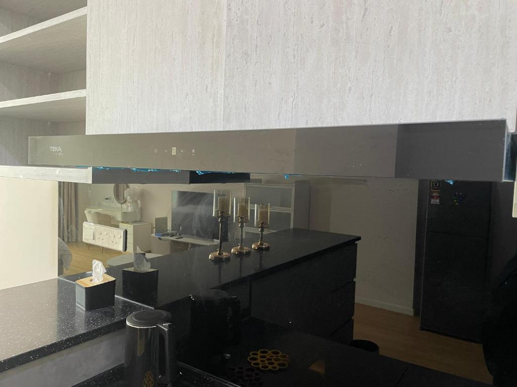 Kuchyň nebo kuchyňský kout v ubytování KO-Z Place Aru Suites