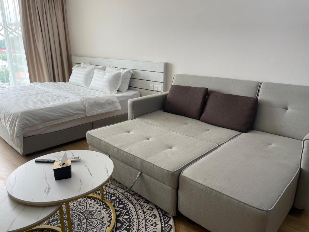 Postel nebo postele na pokoji v ubytování KO-Z Place Aru Suites
