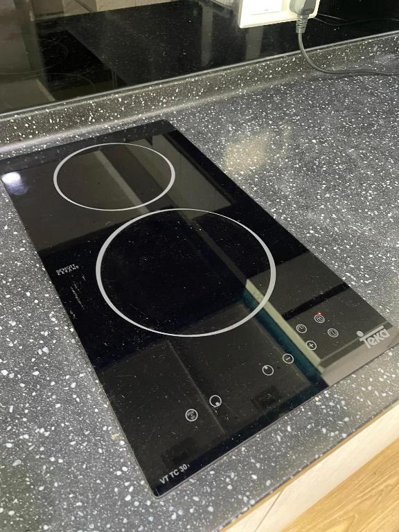 Kuchyň nebo kuchyňský kout v ubytování KO-Z Place Aru Suites