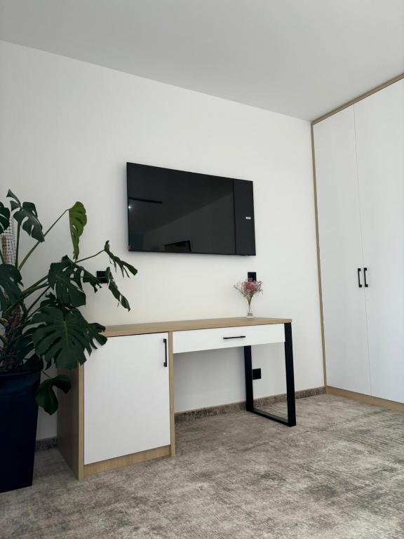 TV a/nebo společenská místnost v ubytování Plaża Resort Łeba & Wellness