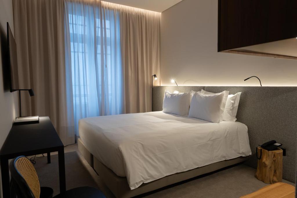 Postel nebo postele na pokoji v ubytování Templo Hotel & SPA