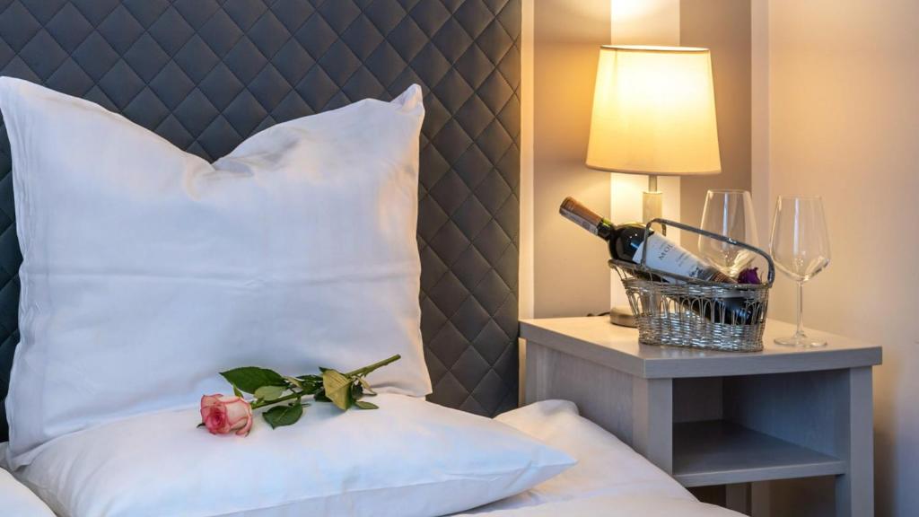 Postel nebo postele na pokoji v ubytování Hotel Amalia