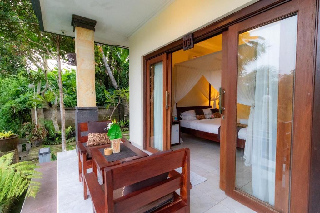 Postel nebo postele na pokoji v ubytování Doni House & Villas