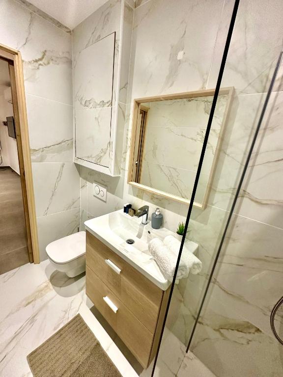 Kúpeľňa v ubytovaní Les Oliviers