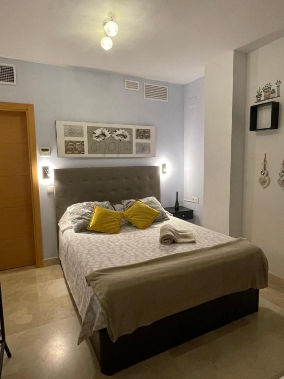 Postel nebo postele na pokoji v ubytování El Carmen Studio