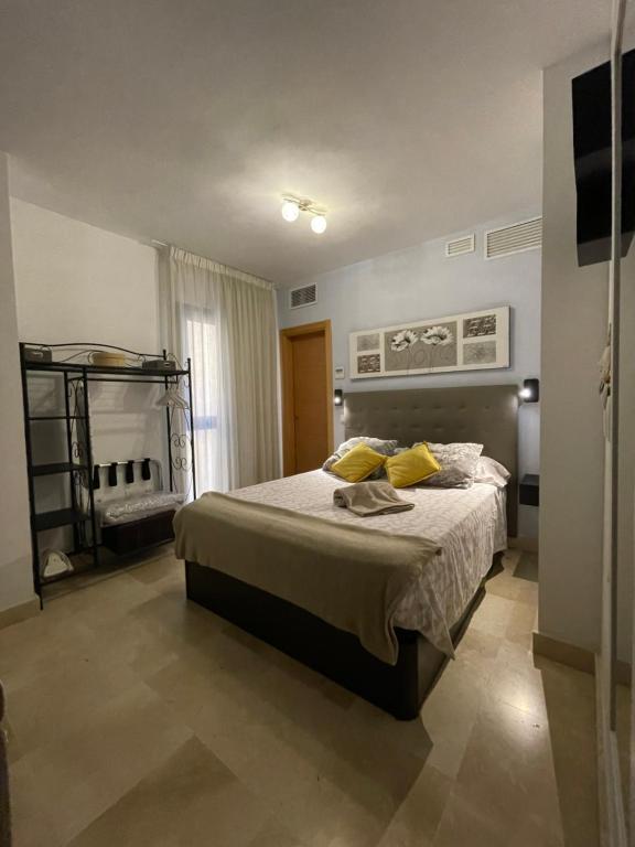 Postel nebo postele na pokoji v ubytování El Carmen Studio