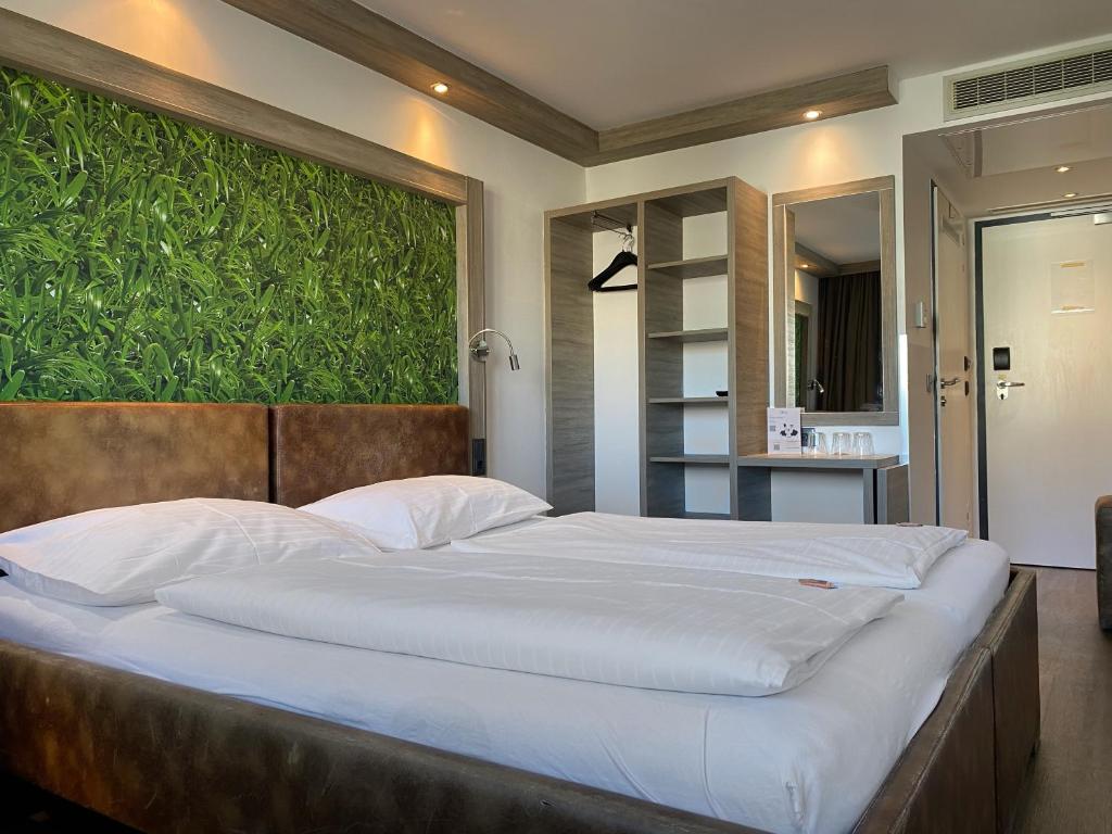 Posteľ alebo postele v izbe v ubytovaní Smart Hotel Schönbrunn