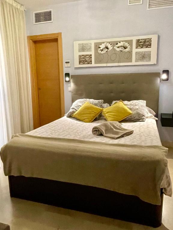 Postel nebo postele na pokoji v ubytování El Carmen Studio