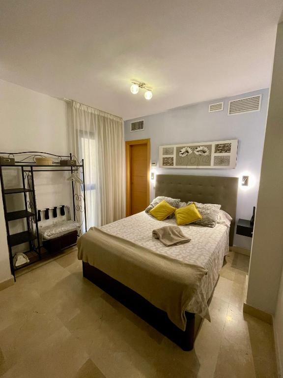 Postel nebo postele na pokoji v ubytování El Carmen Studio