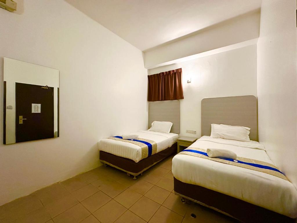 Postel nebo postele na pokoji v ubytování Park Hotel