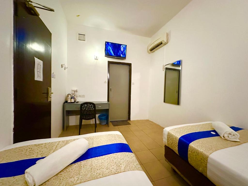 Postel nebo postele na pokoji v ubytování Park Hotel