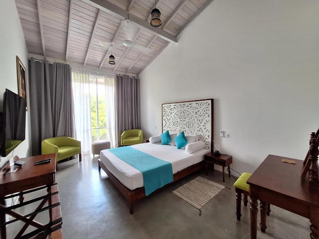 Postel nebo postele na pokoji v ubytování Angam Villas Colombo