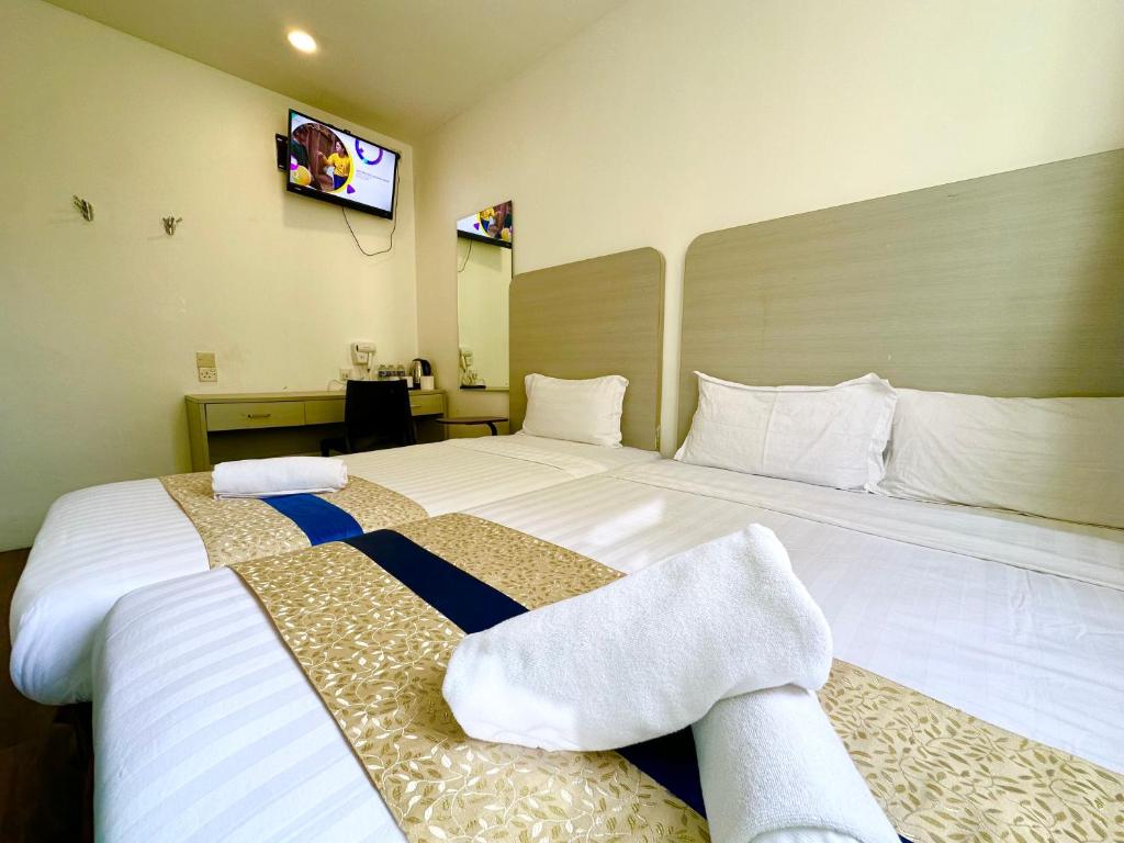 Postel nebo postele na pokoji v ubytování Park Hotel