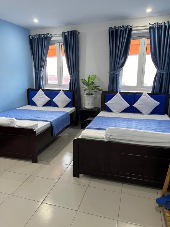 Postel nebo postele na pokoji v ubytování SEASONS Hotel