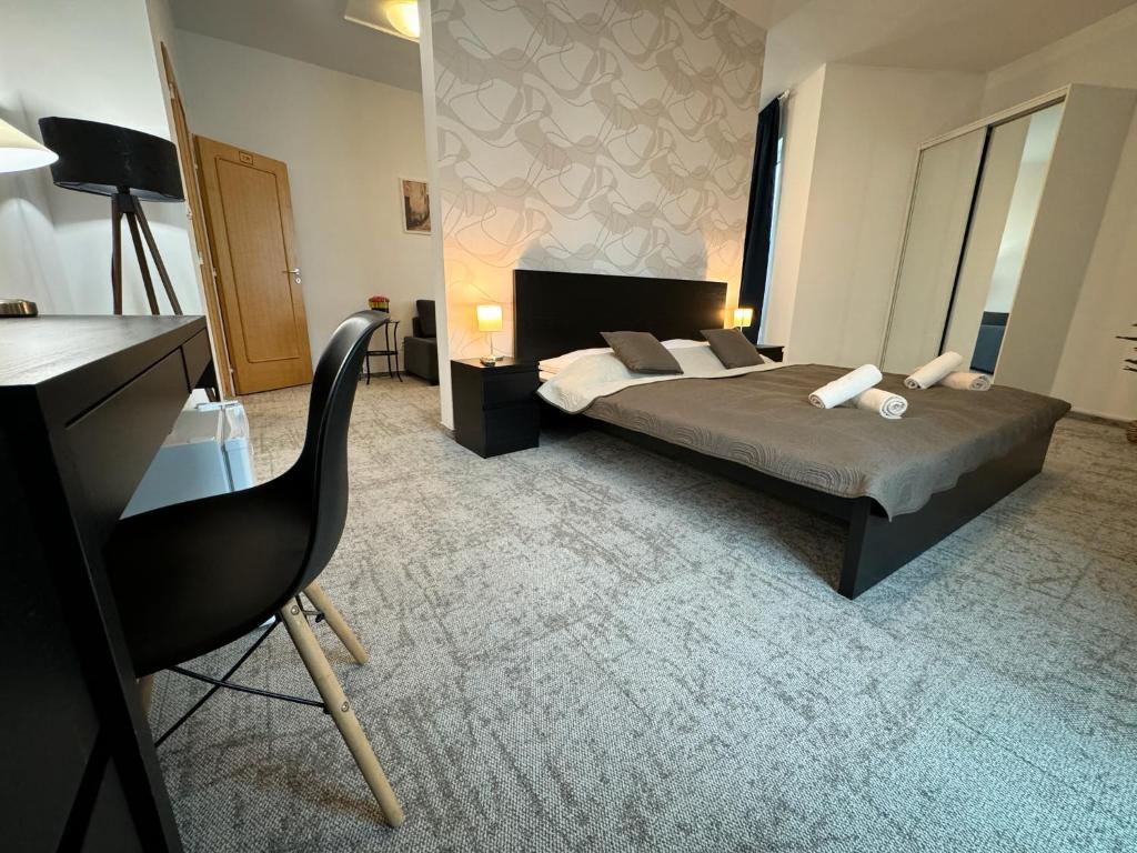 Postel nebo postele na pokoji v ubytování Hotel Modena