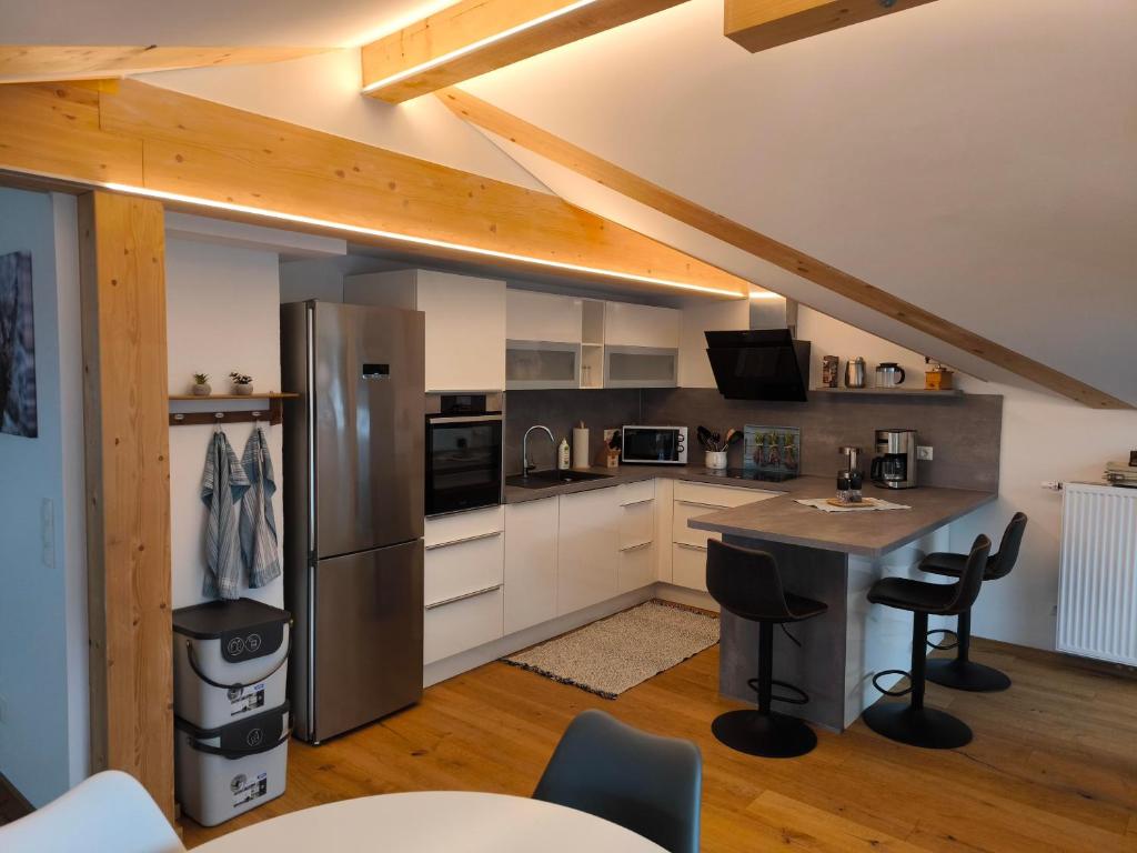 Kuchyň nebo kuchyňský kout v ubytování s´Vogelhüs