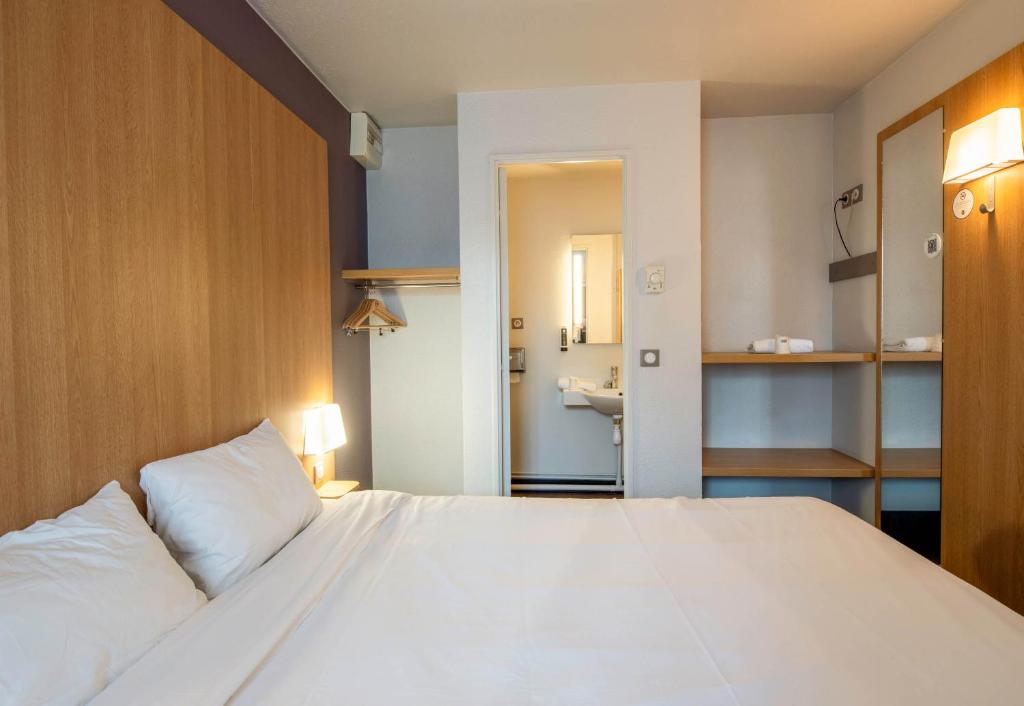 Postel nebo postele na pokoji v ubytování B&B HOTEL Amiens