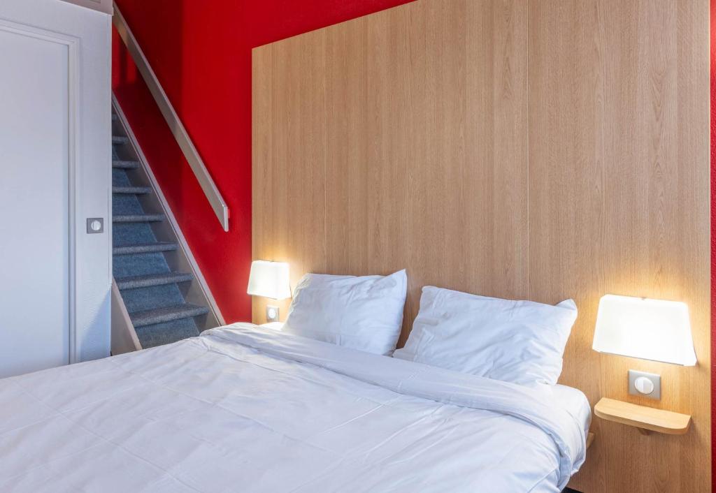 Postel nebo postele na pokoji v ubytování B&B HOTEL Amiens