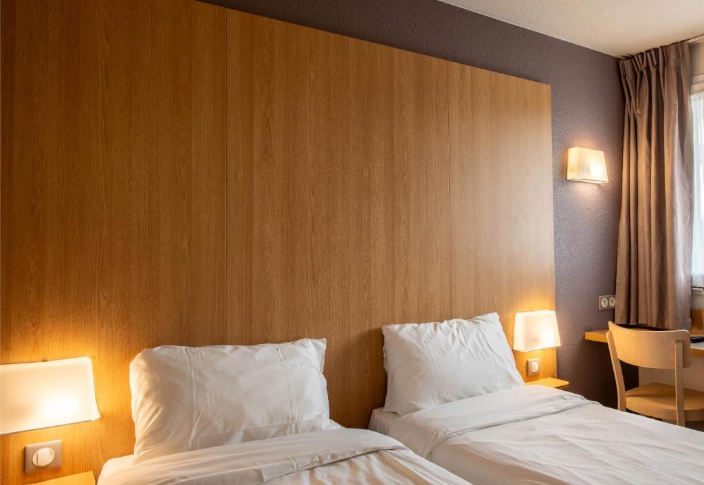 Postel nebo postele na pokoji v ubytování B&B HOTEL Amiens