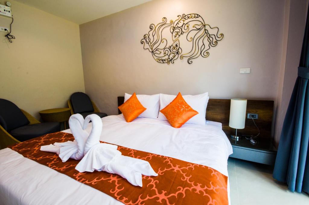 Postel nebo postele na pokoji v ubytování Chomphu Resort