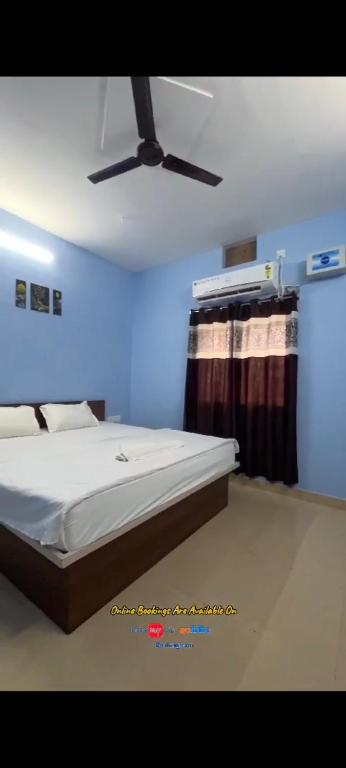 Postel nebo postele na pokoji v ubytování Hotel Siddhi