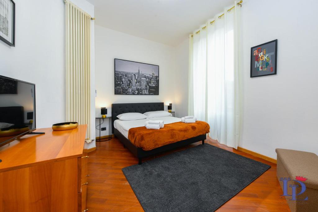 Televízia a/alebo spoločenská miestnosť v ubytovaní DesenzanoLoft Official Partner MARRIOTT Homes & Villas - Let It Be A Dream - Renovation 2025 Lake View