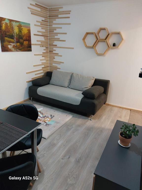 Posezení v ubytování Refugiu Alpin Borsec