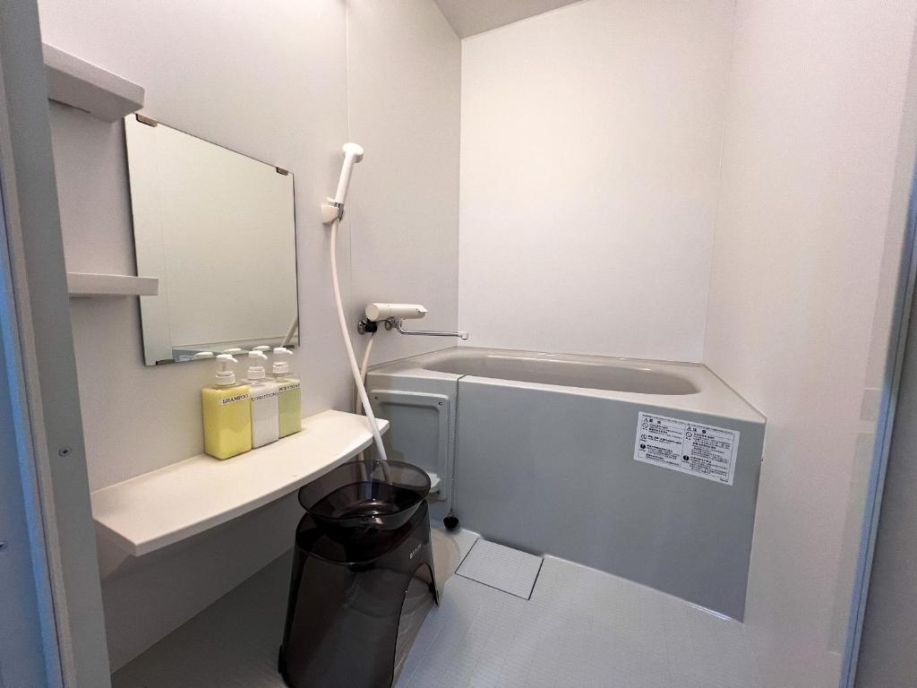 Koupelna v ubytování OUCHI HOTEL Onaganishi