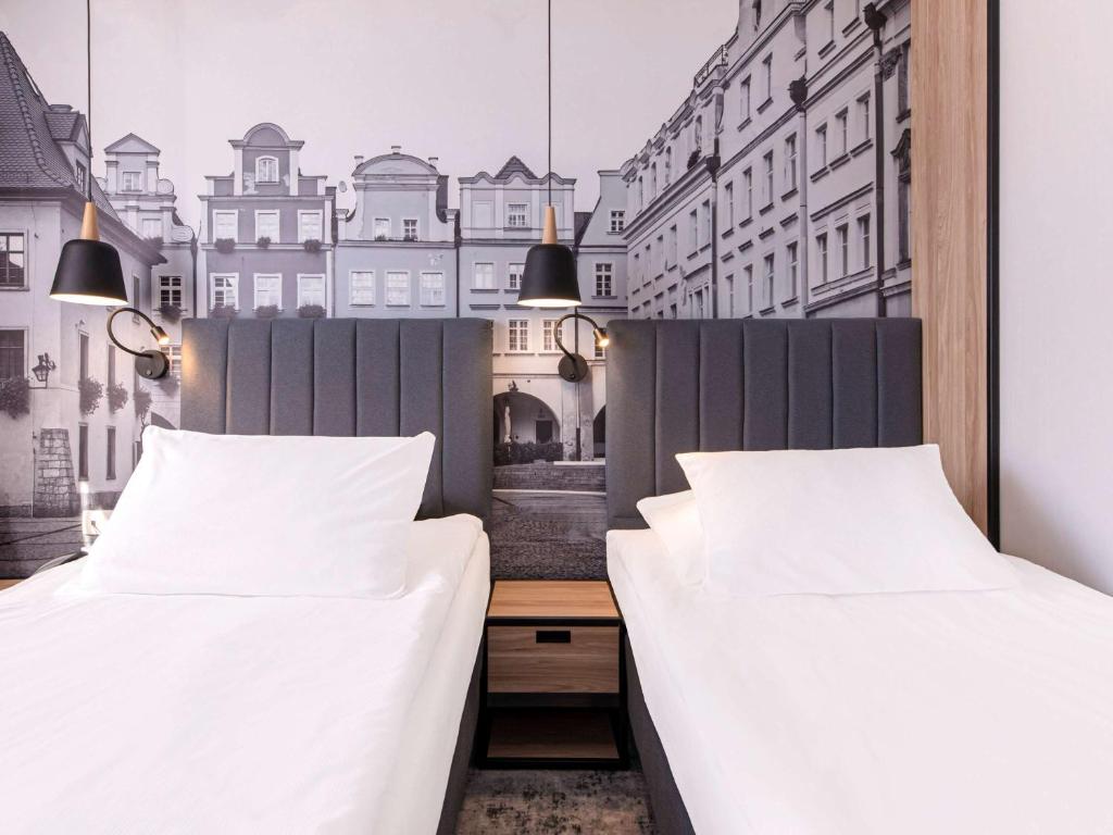 Posteľ alebo postele v izbe v ubytovaní Mercure Jelenia Góra