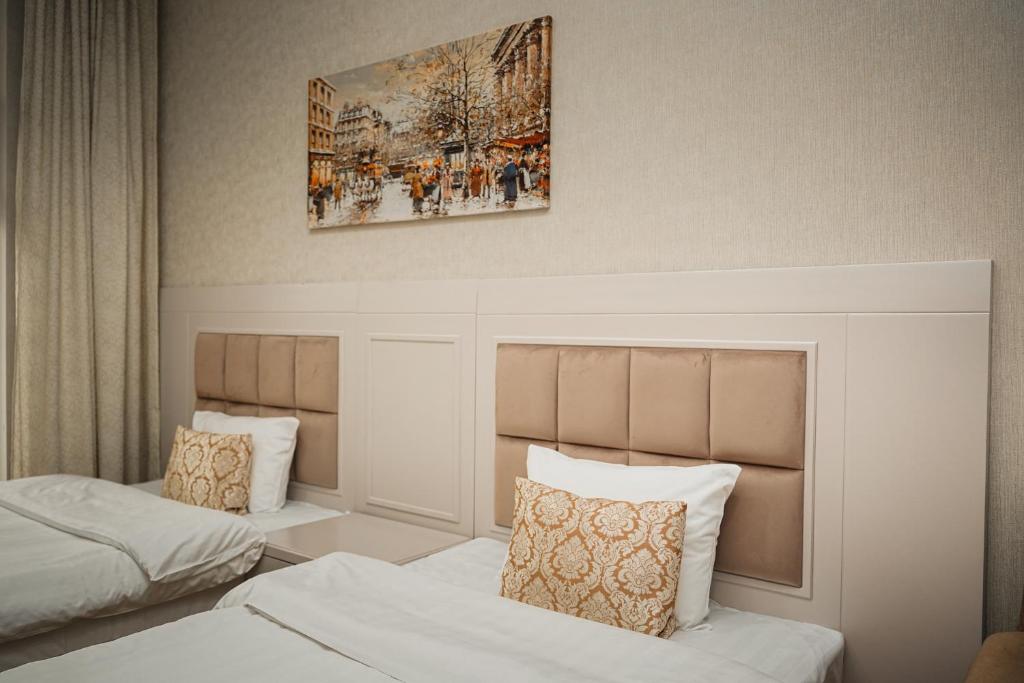 Postel nebo postele na pokoji v ubytování Safran Hotel